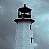 jadzibelle: A black-and-white lighthouse against heavy grey cloudcover. (grey, havensyfy, lighthouse, textless)
