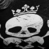 james_madison: Photo is of a black and white image of a lopsided skull with crown. It's a favorite t-shirt (skull)