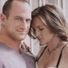 doranwen: Elliot with Olivia pressed up against him, her hand on his shoulder as she looks down (EO from SVU)