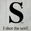 jesse_the_k: cap Times Roman "S" with nick in upper corner, captioned "I shot the serif." (shot the serif)