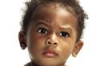 nike: A little girl raising her eyebrow. (eyebrow)