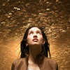 genarti: Woman looking up into gold bubbles. ([misc] magic in every moment)