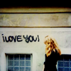 balsamandash: stock: a woman looking at grafiti that says "i love you!" (> I love you!)
